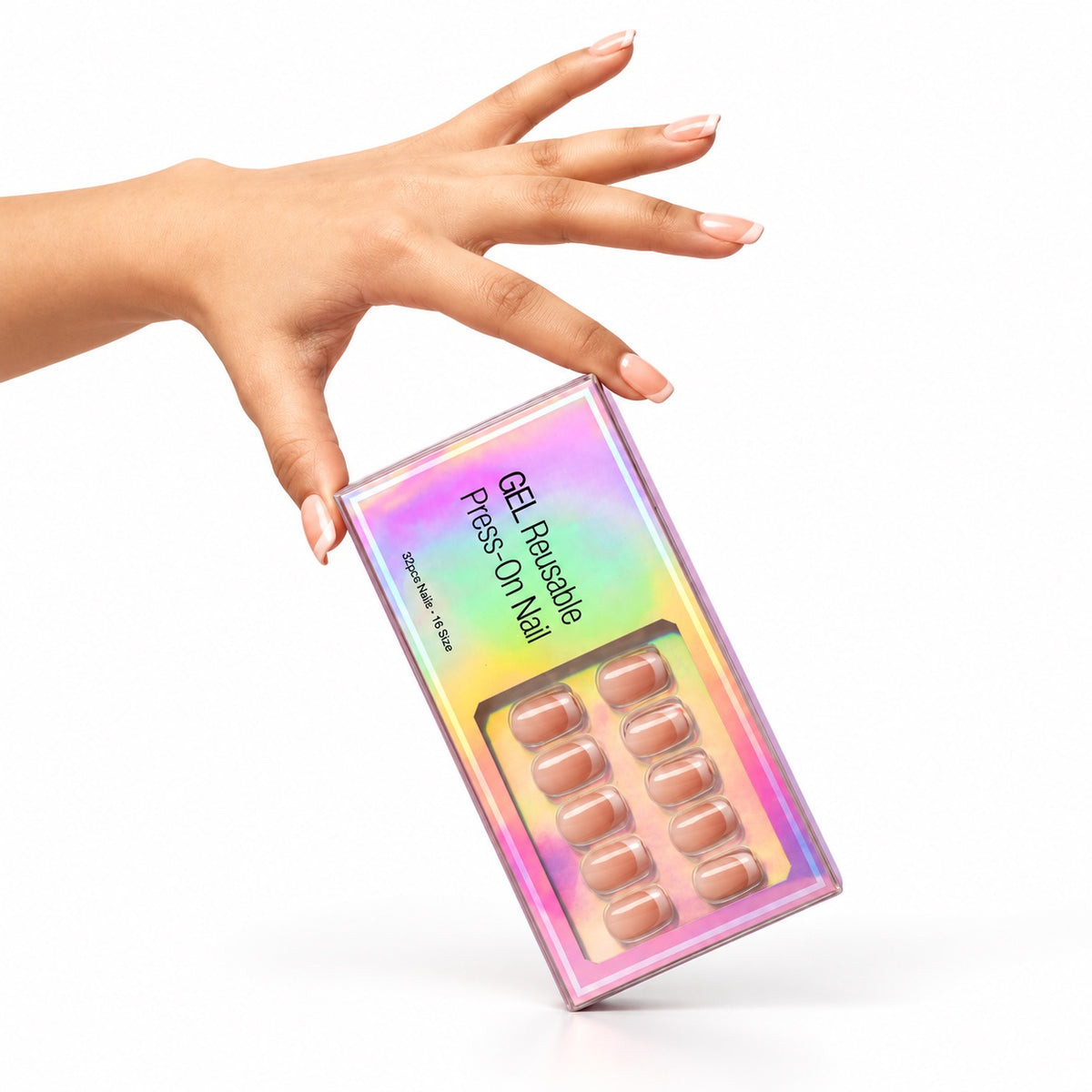 Hand with a French press-on manicure holding the holographic press-on nail box
