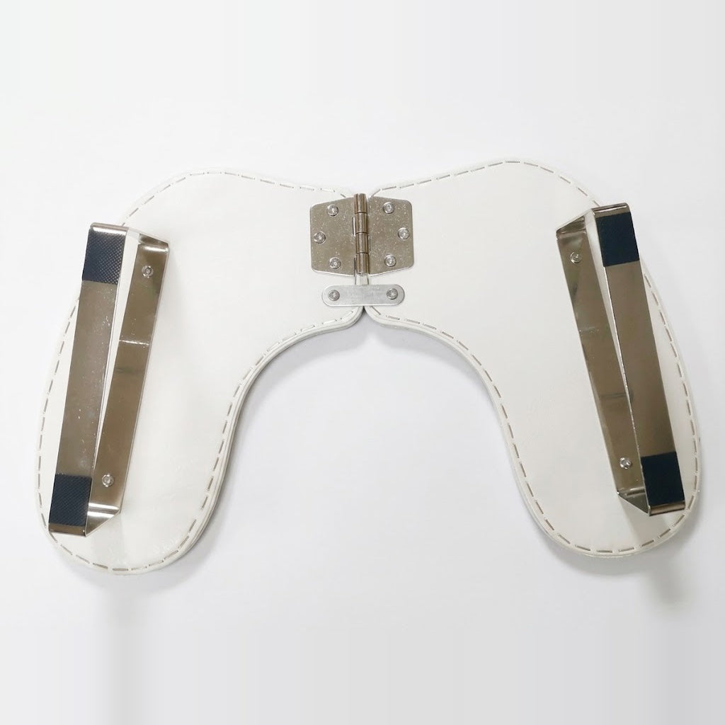 Underside of the RN-H8 arm rest with its folding hinge and metal stands