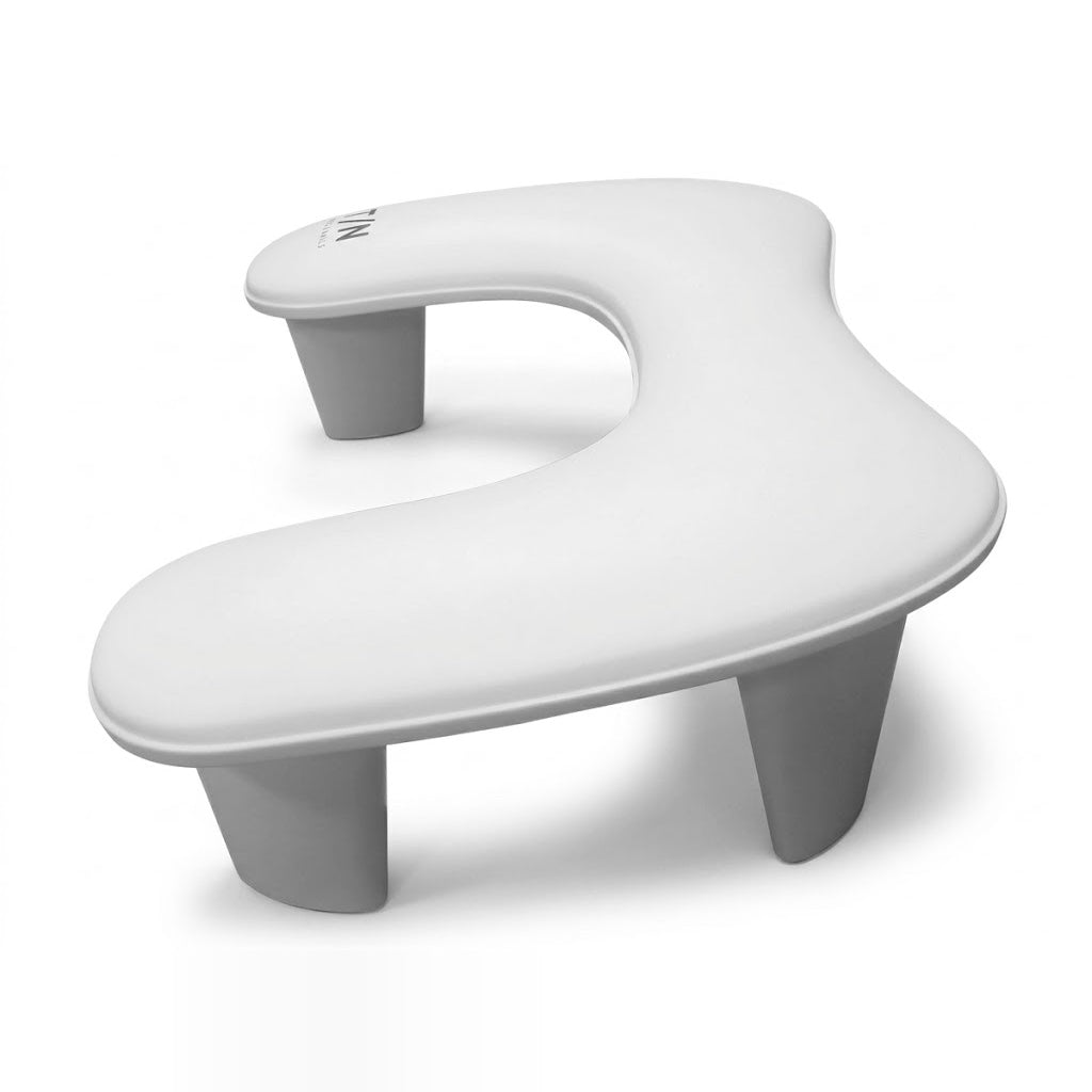 RN-U1 nail arm rest pillow from the side, showing its legs