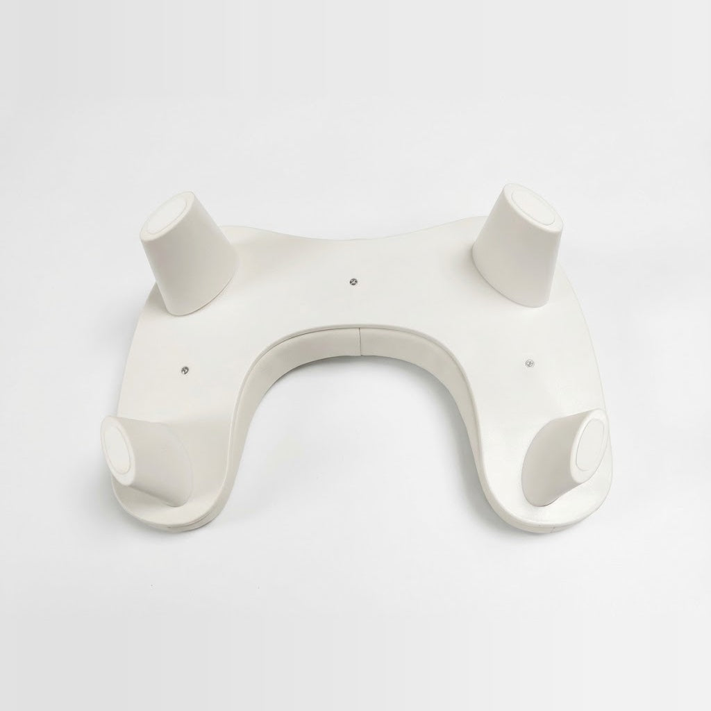 Underside of the RN-U1 nail arm rest showing its four legs