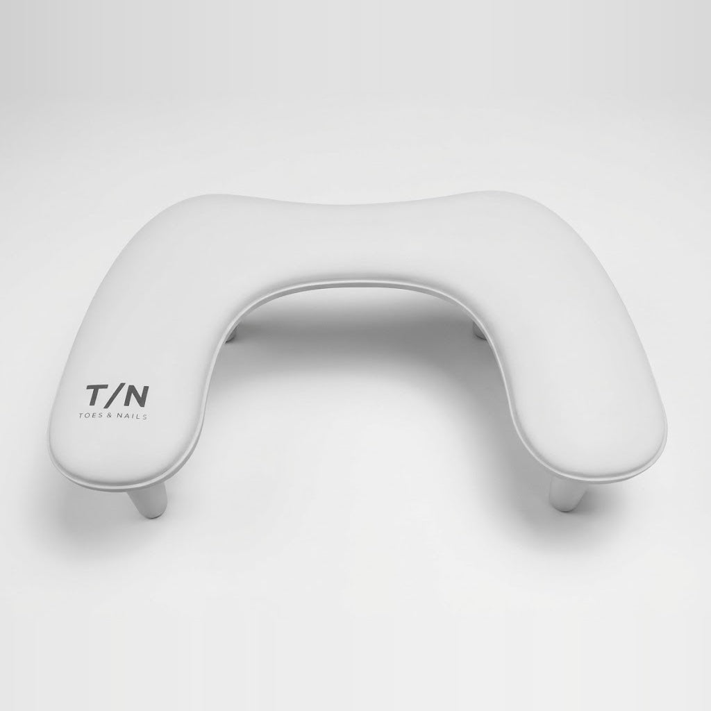 White RN-U1 U-shaped nail arm rest pillow with Toes & Nails logo